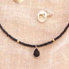 Load image into Gallery viewer, Aurielle by NOIR Jewellery - Tear Drop Charm Necklace - Black and Gold
