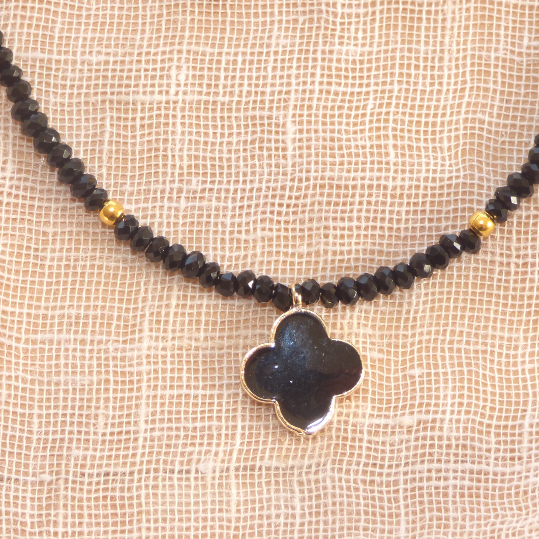 Collette Necklace by NOIR Jewellery - Black and Gold with Black Charm